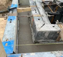 Poured concrete into frame