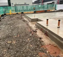 Steel rebar placement in reinforced concrete footing